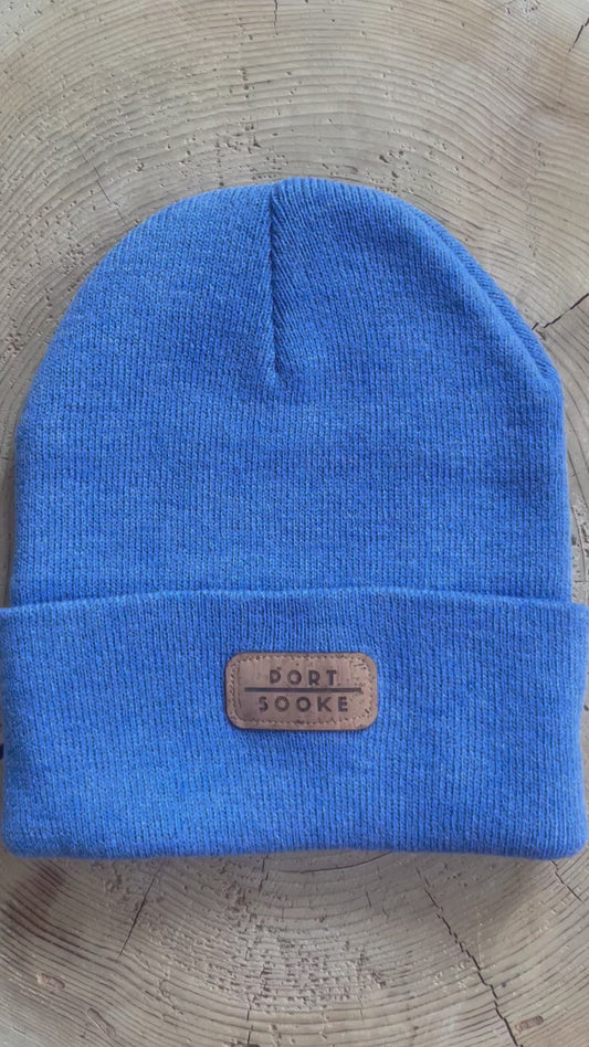 Sky blue tan tag toque